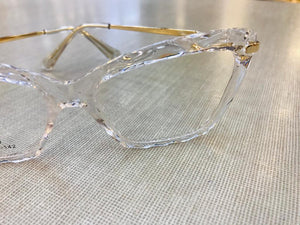 Armação Marilia Mendonça Cristal Transparente 3D Haste Fina Dourada